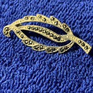 Sterling Marquisate leaf-shaped pin. 1” long x 1/2” wide. Marked 925 A